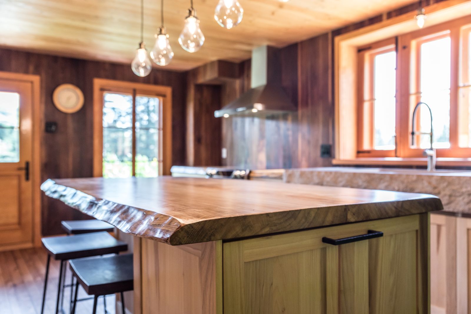 Rustic kitchen with a live-edge solid wood island